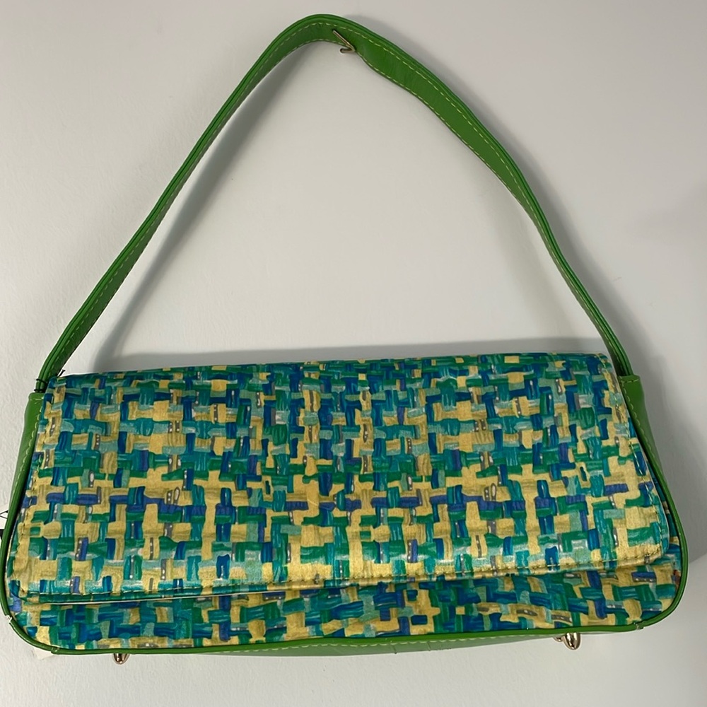 J Renee NWT purse. Scratched on the bottom see picture.